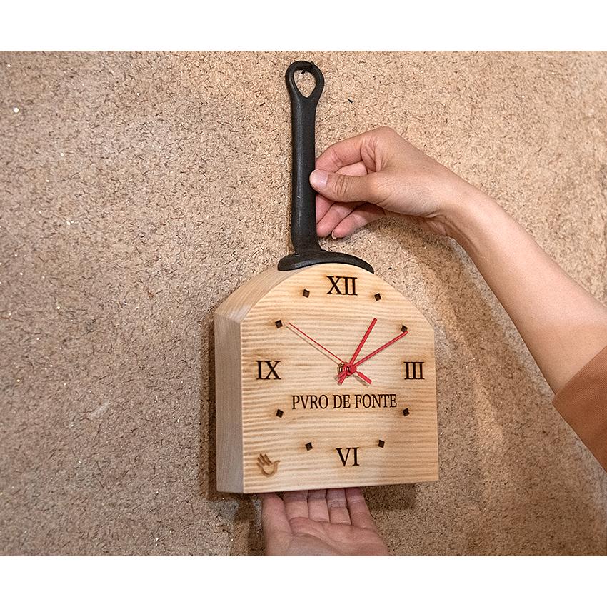 Magnolia wood clock with iron pan handle